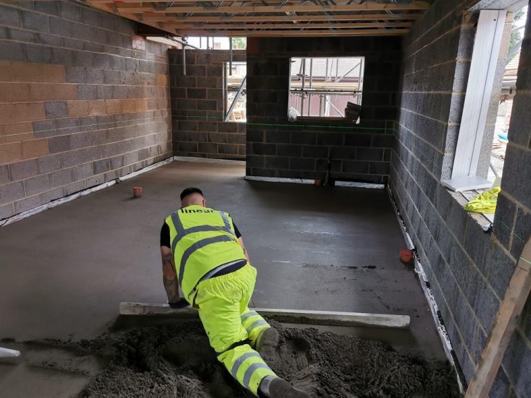 One of our floor screeders laying a screed on a project in Watlington, Oxford